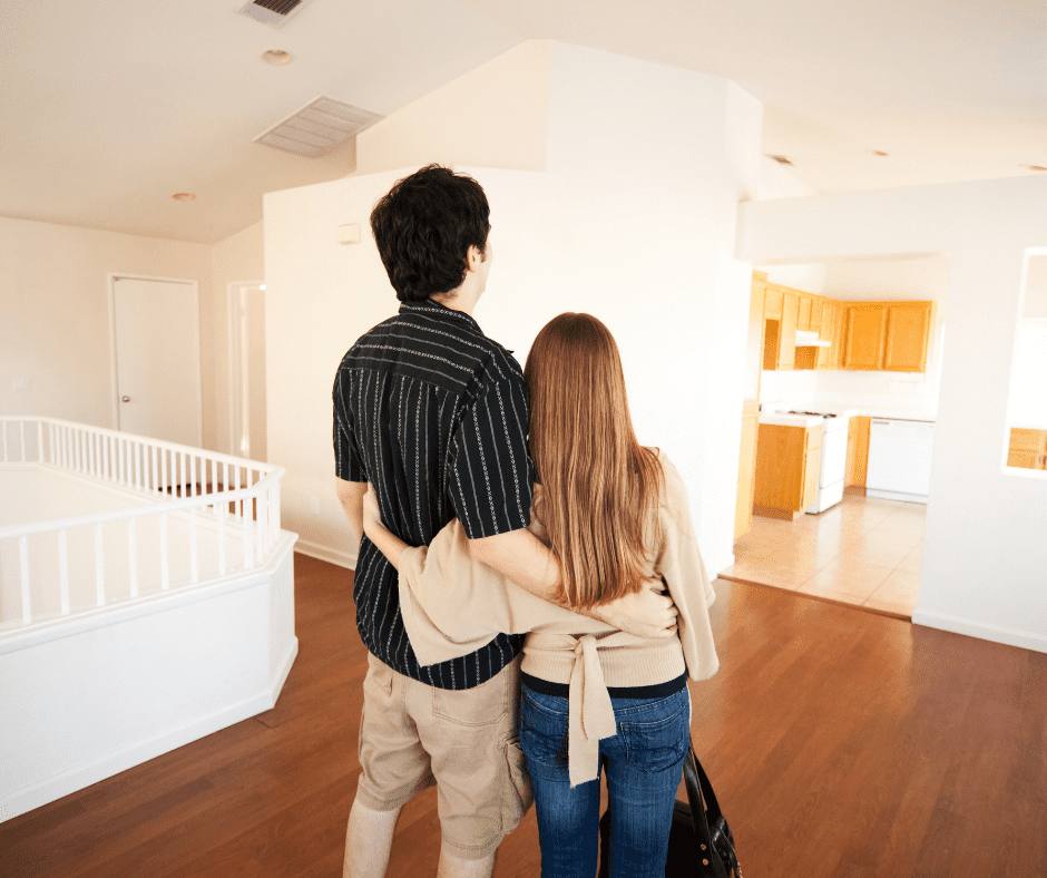 couple buying a foreclosure home