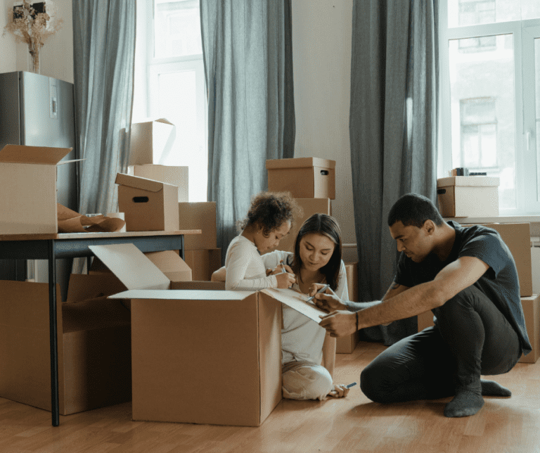 growing family with moving boxes